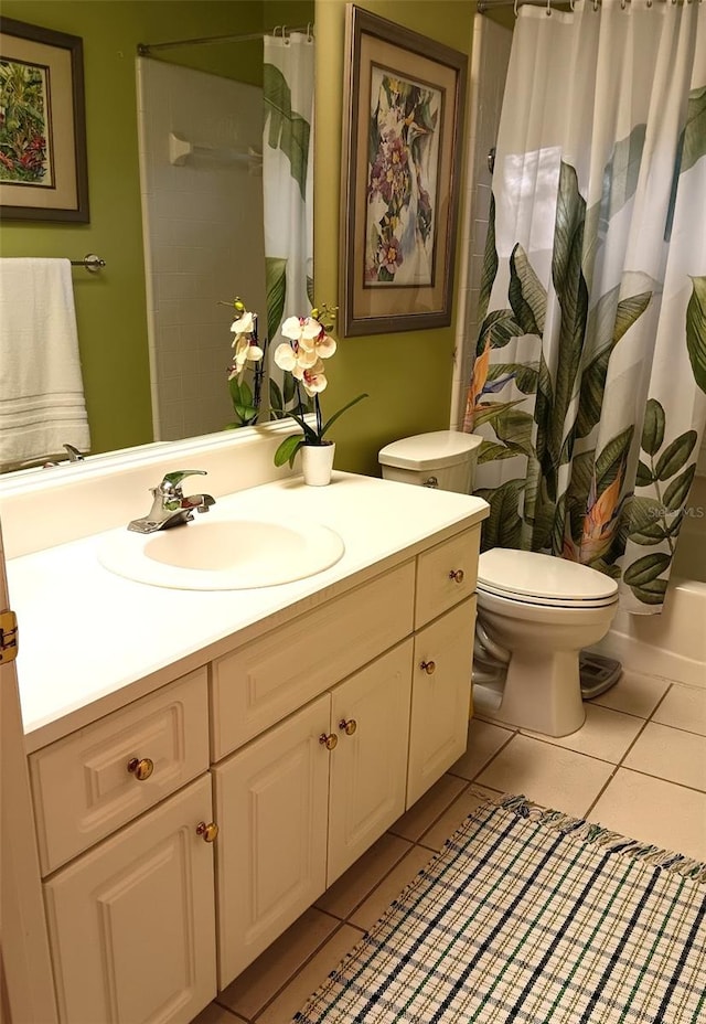 full bathroom with tile patterned flooring, toilet, shower / bath combo with shower curtain, and vanity