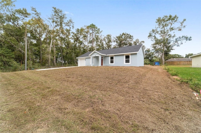 view of front of home with a front yard