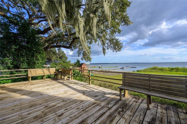 deck featuring a water view