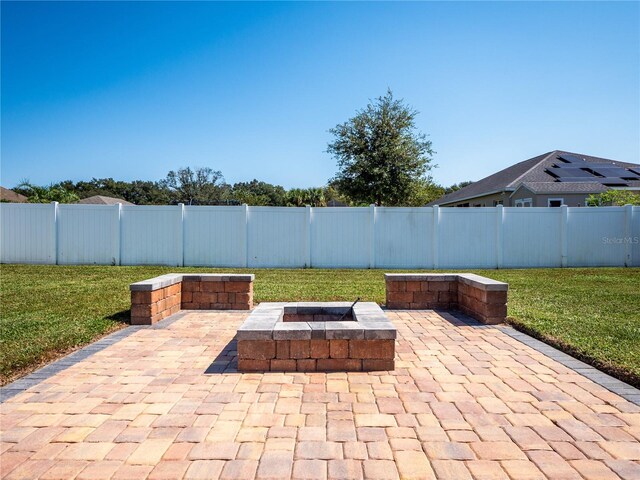 view of patio featuring an outdoor fire pit