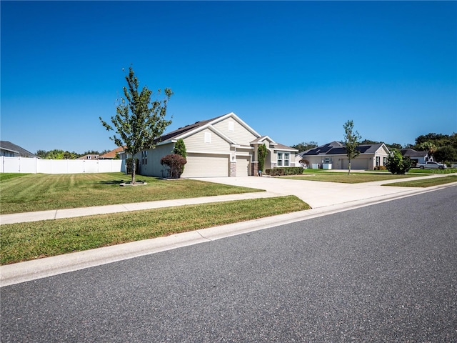 ranch-style house with a front lawn and a garage