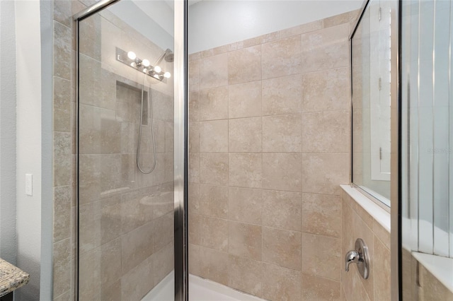 bathroom featuring walk in shower