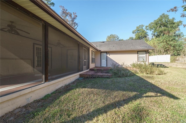 view of yard featuring a sunroom