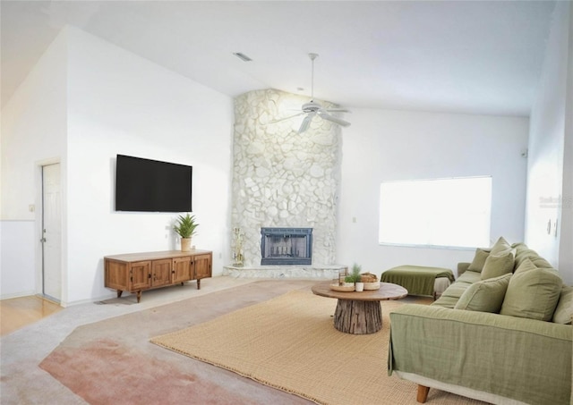 4215 SE 24th Ter, Ocala, FL 34480 - living room with lofted ceiling, a ceiling fan, a fireplace, and carpet floors