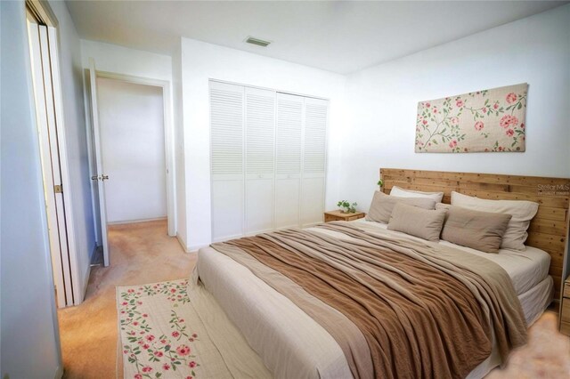 4215 SE 24th Ter, Ocala, FL 34480 - bedroom with light colored carpet and a closet