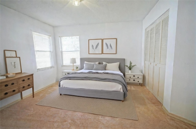 4215 SE 24th Ter, Ocala, FL 34480 - bedroom featuring light colored carpet and a closet