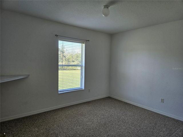 unfurnished room with carpet floors