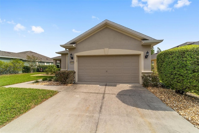 view of front facade featuring a garage and a front lawn