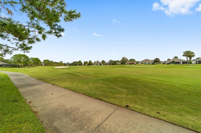 view of community featuring a lawn