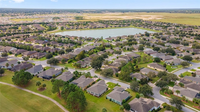 aerial view with a water view and a residential view
