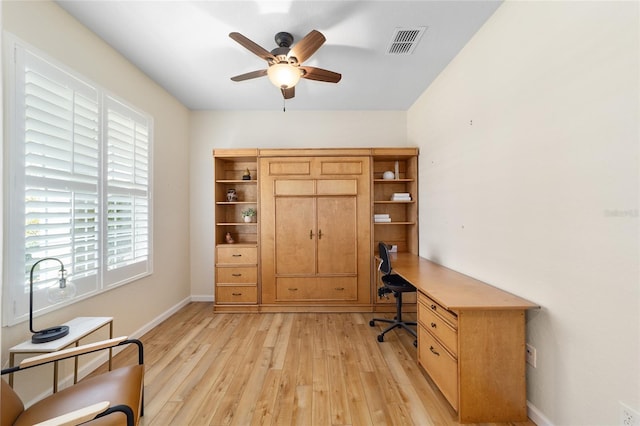 office area with light hardwood / wood-style floors and ceiling fan