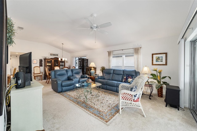 living room featuring ceiling fan with notable chandelier, lofted ceiling, and carpet