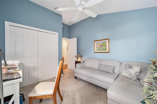 office featuring ceiling fan, carpet flooring, and lofted ceiling