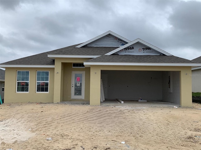 view of front of property featuring a garage