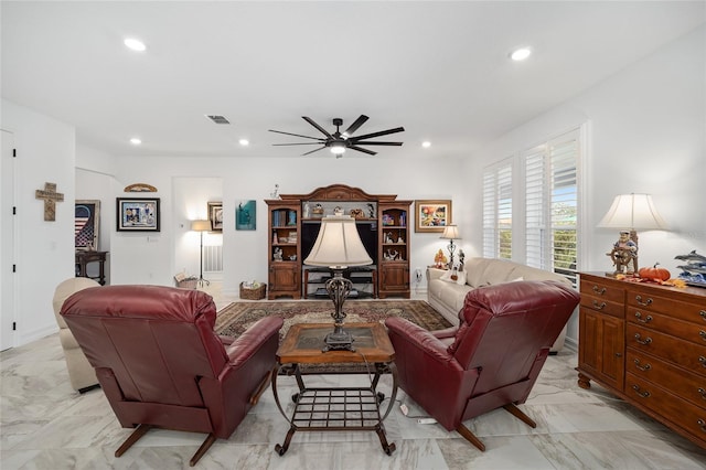 living room featuring ceiling fan