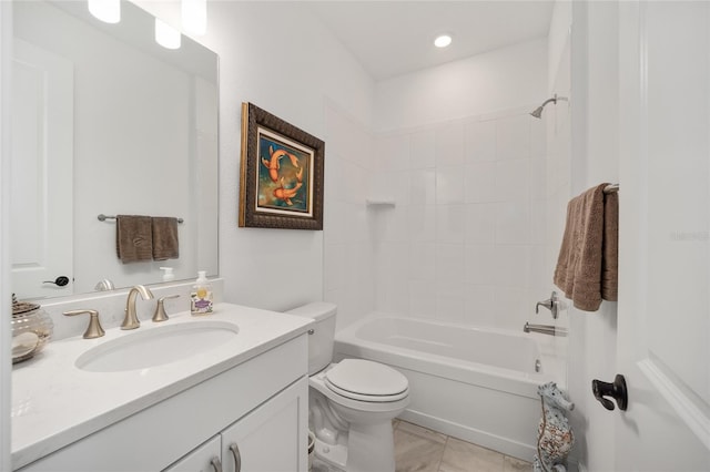 full bathroom featuring toilet, tiled shower / bath combo, and vanity