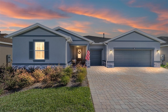 ranch-style home with a garage