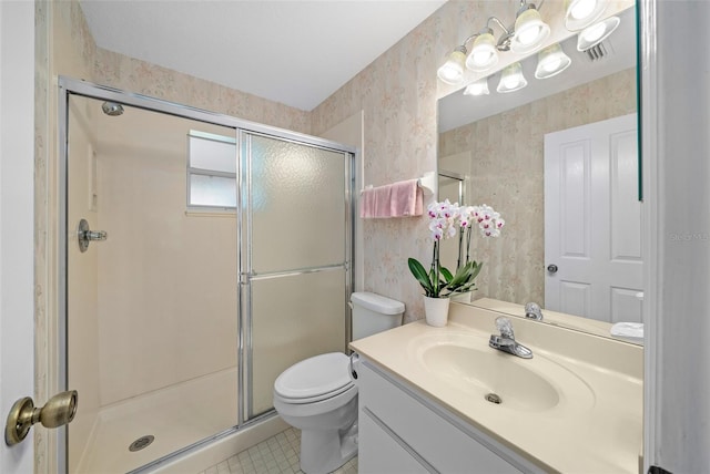 bathroom featuring a shower with door, toilet, tile patterned floors, and vanity