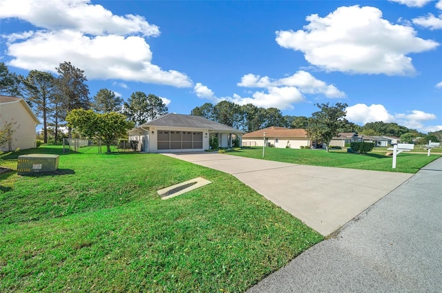 single story home with a front yard and a garage