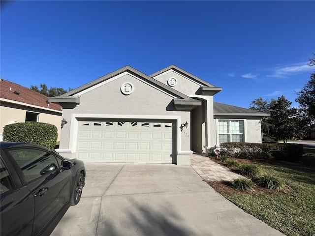 view of front of property with a garage