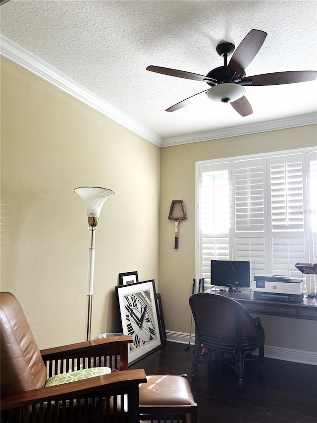 office space with ornamental molding, dark wood-type flooring, a textured ceiling, and ceiling fan