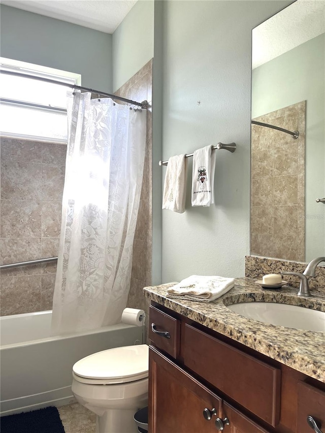 full bathroom with vanity, toilet, and shower / bath combination with curtain