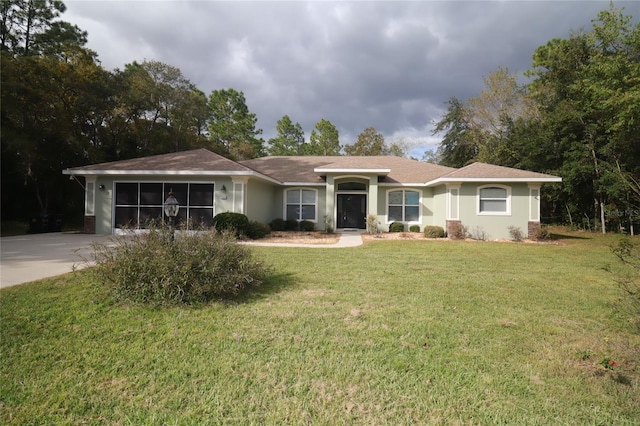 ranch-style home featuring a front lawn