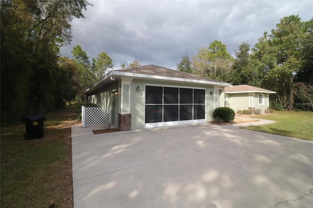 view of property exterior featuring a lawn