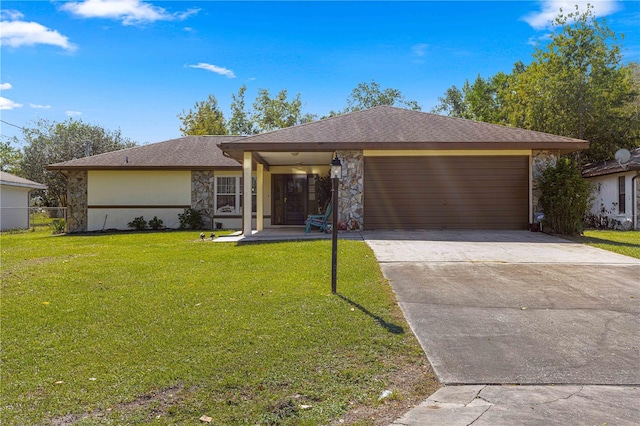 single story home featuring a front yard and a garage