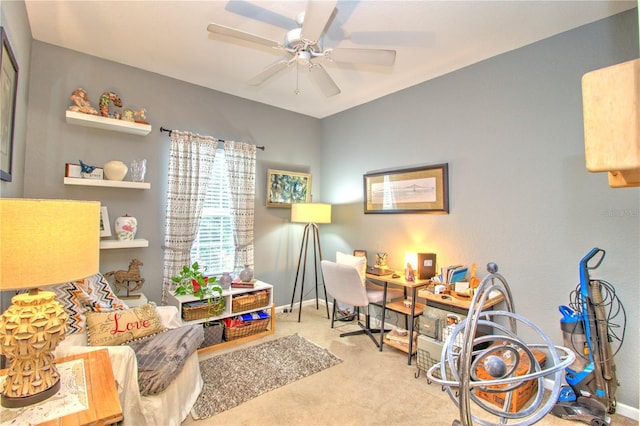 carpeted home office with ceiling fan