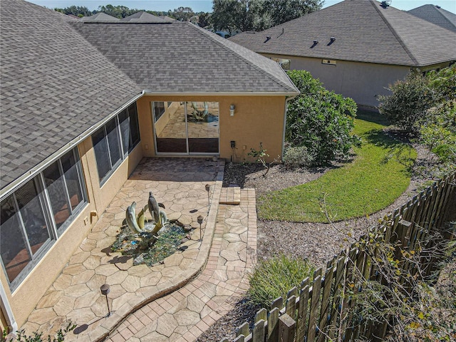 rear view of property with a patio