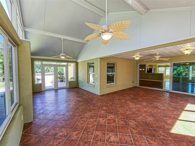 unfurnished sunroom with french doors and lofted ceiling with beams