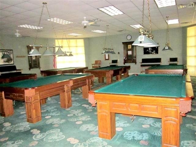 rec room featuring a paneled ceiling, billiards, and carpet flooring