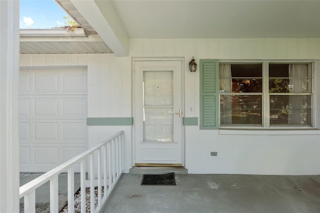 property entrance with a garage