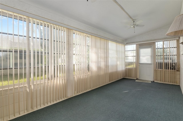 unfurnished sunroom featuring lofted ceiling and ceiling fan