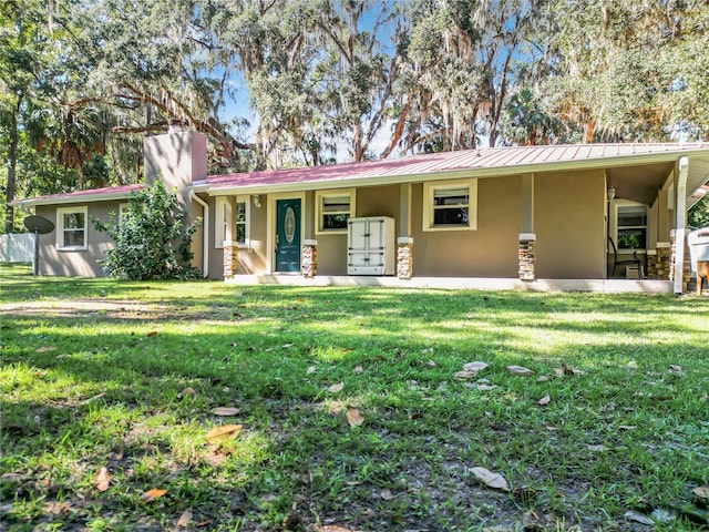 view of front facade with a porch and a front yard