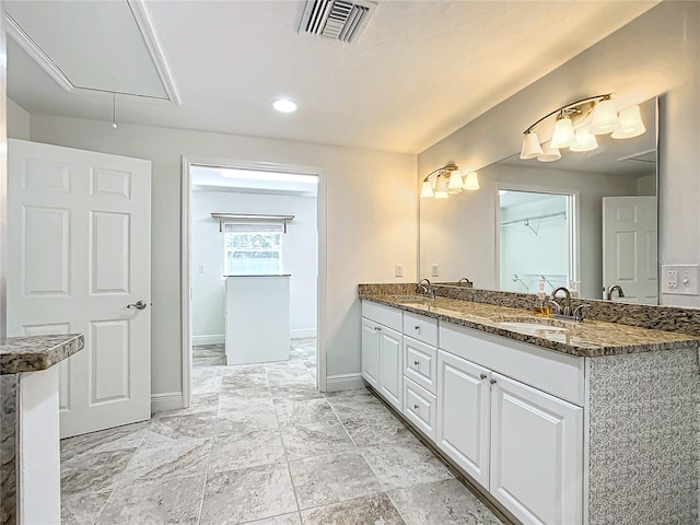 bathroom featuring vanity