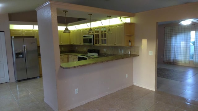 kitchen featuring kitchen peninsula, appliances with stainless steel finishes, backsplash, pendant lighting, and light tile patterned flooring