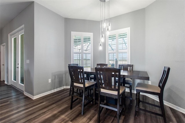 dining area with dark wood-type flooring