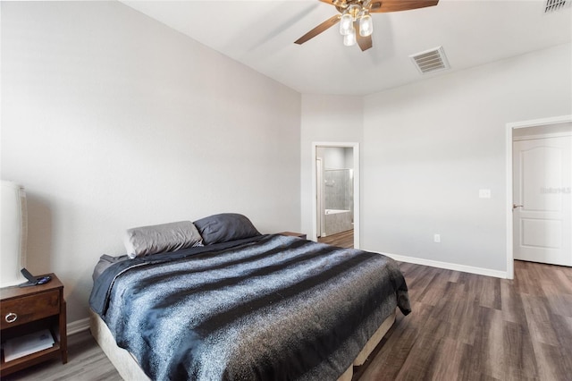 bedroom featuring hardwood / wood-style floors, connected bathroom, and ceiling fan