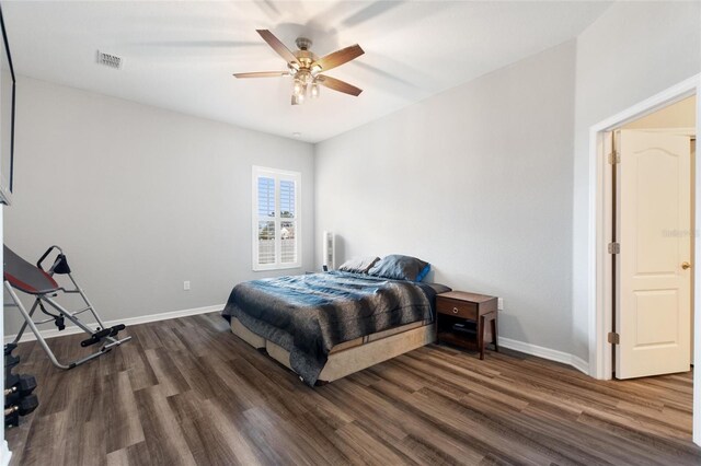 bedroom featuring dark wood-type flooring and ceiling fan