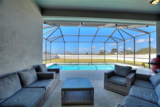 view of pool featuring an outdoor living space, a lanai, and a patio area