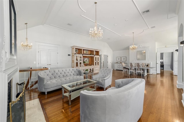 living room featuring crown molding, vaulted ceiling, and dark hardwood / wood-style flooring