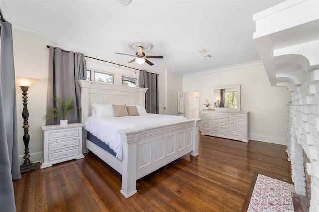 bedroom featuring ceiling fan, multiple windows, dark hardwood / wood-style flooring, and crown molding