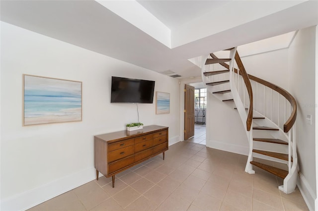 living room with light tile patterned floors