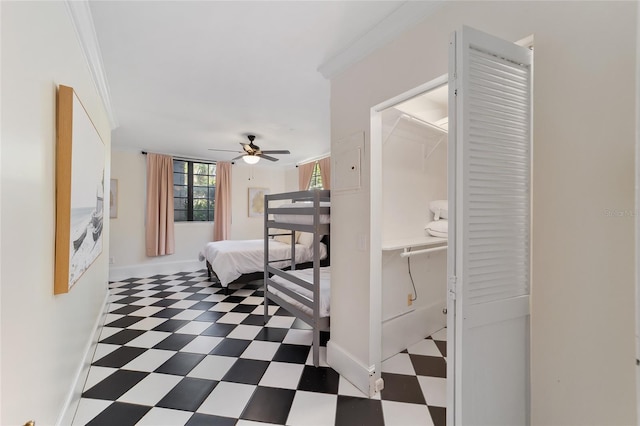 bedroom with crown molding and ceiling fan