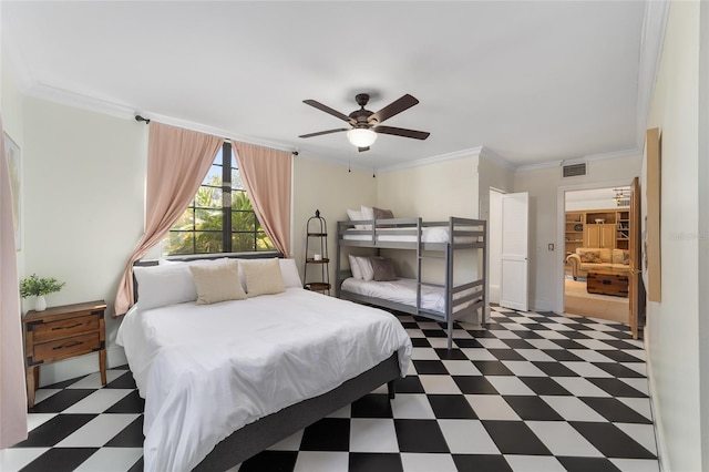 bedroom featuring ceiling fan and ornamental molding