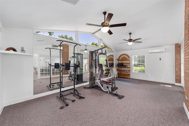 exercise room featuring an AC wall unit, carpet, a wealth of natural light, and lofted ceiling