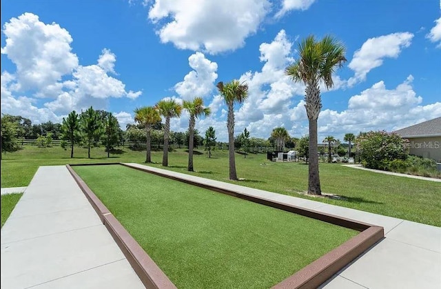 view of community featuring a lawn