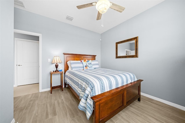 bedroom featuring light hardwood / wood-style flooring and ceiling fan